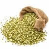 Split green moong beans spilling from a burlap sack