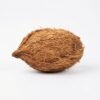 Whole brown coconut with fibrous husk