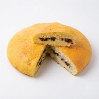 Cut Iyengaran Bakery Dilkhush bun showing its filling